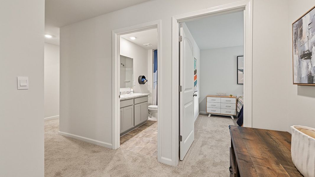 Representative furnished interior of a home built from the ROBIE by D.R. Horton in Pointe Park, Union City (Image 34).