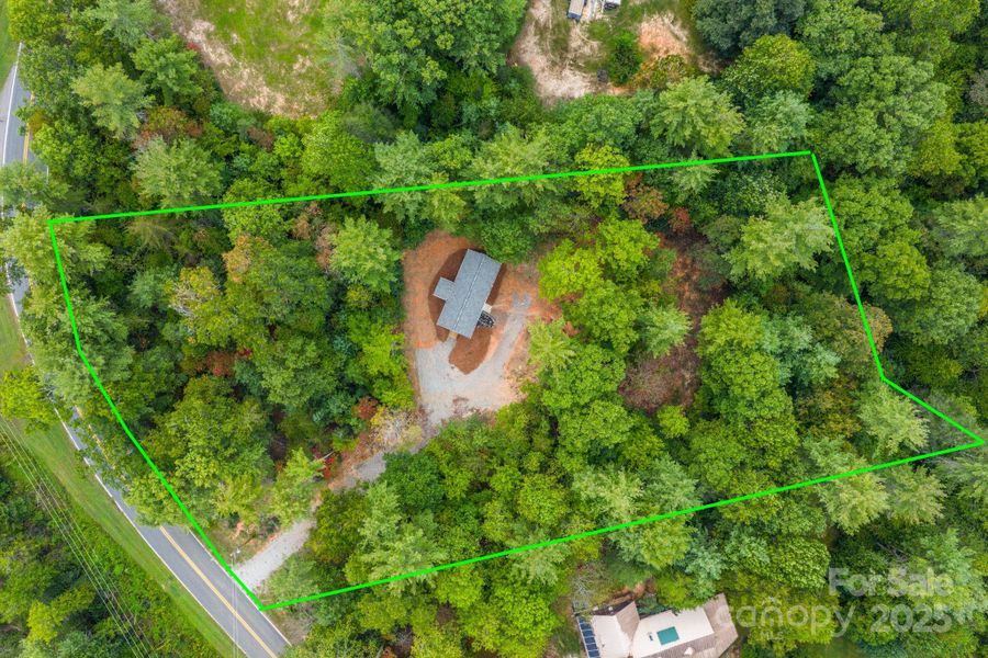 View of lot size 1.38 acres with a small creek at the back of property.