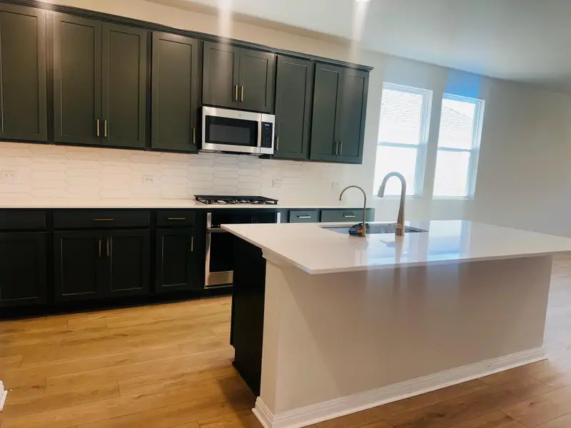 Furnished interior view inside a new home in Patterson Ranch, Georgetown (Image 8). Furnished interior view inside a new home in Patterson Ranch, Georgetown (Image 8).