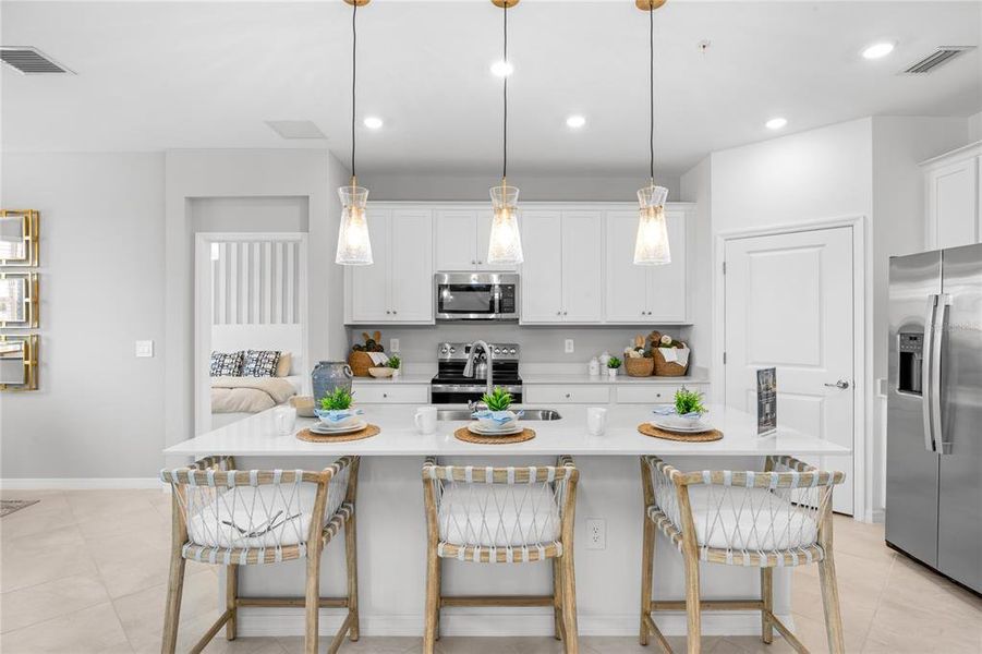 Furnished interior view inside a new home in Wellen Park Golf & Country Club, Venice (Image 7).