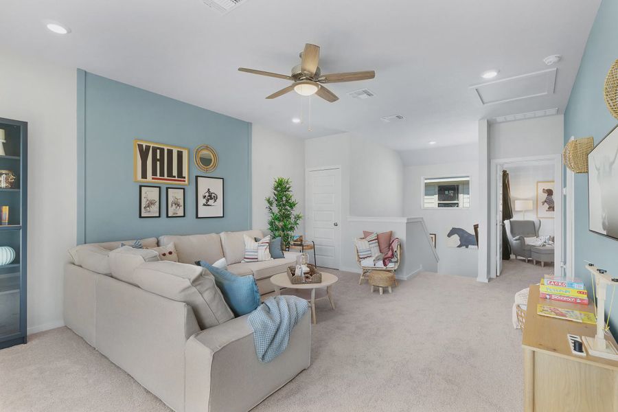 Representative furnished interior of a home built from the Wilshire by Chesmar Homes in Stream Waters, Buda (Image 14).