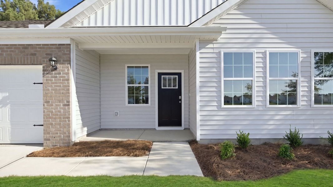 Exterior details and patio area of a home in Tyler - Home on the Lake, New Bern (Image 3).