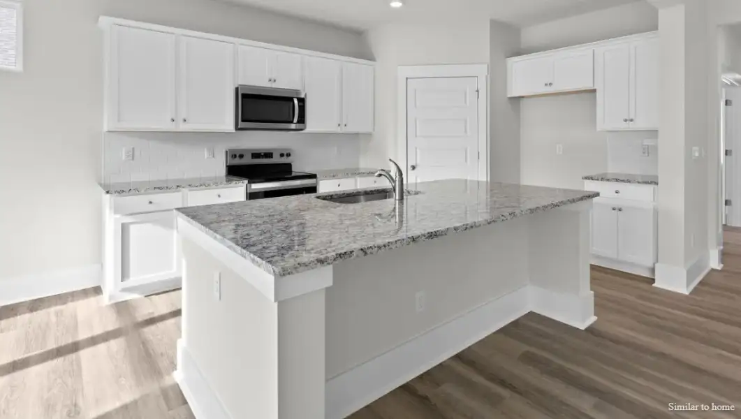 Furnished interior view inside a new home in The Highlands at Cedar Hill Landing, Navassa (Image 6).