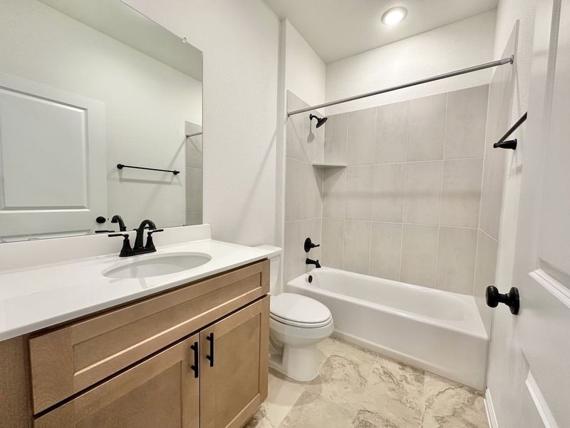 Furnished interior view inside a new home in Sage Hollow, Kyle (Image 13).