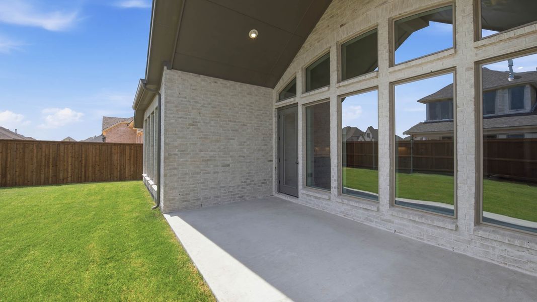 Exterior details and patio area of a home in Myrtle Creek, Waxahachie (Image 4). Exterior details and patio area of a home in Myrtle Creek, Waxahachie (Image 4).
