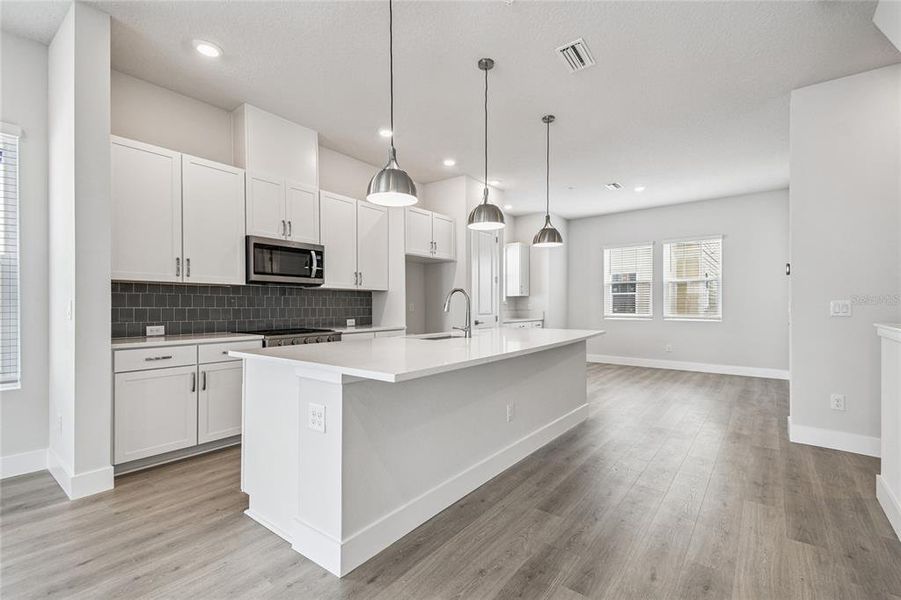 Furnished interior view inside a new home in Apex at Seminole Heights, Tampa (Image 11). Furnished interior view inside a new home in Apex at Seminole Heights, Tampa (Image 11).