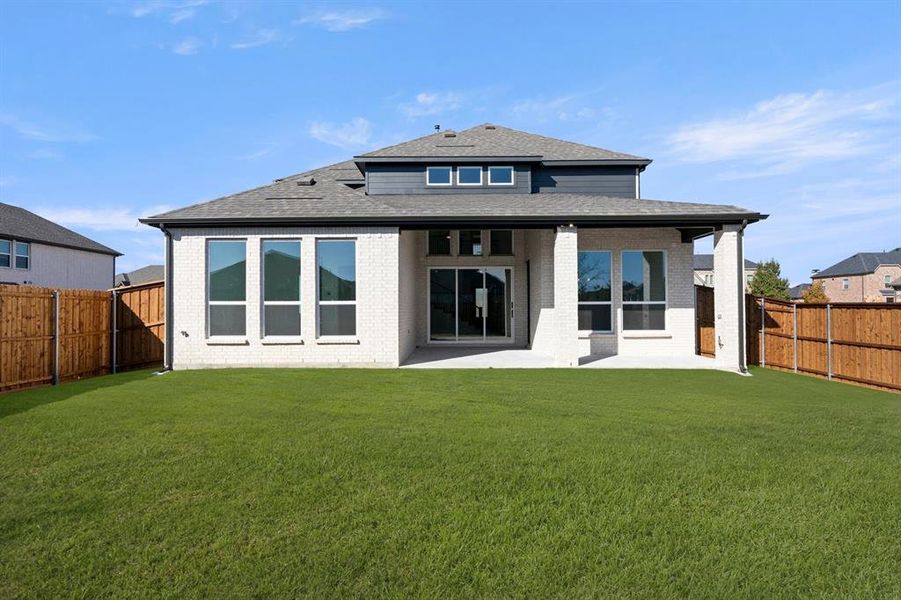 Exterior details and patio area of a home in Valencia on The Lake, Little Elm (Image 20). Exterior details and patio area of a home in Valencia on The Lake, Little Elm (Image 20).