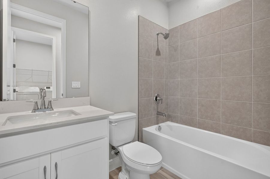 Furnished interior view inside a new home in Windwater, Parrish (Image 7).