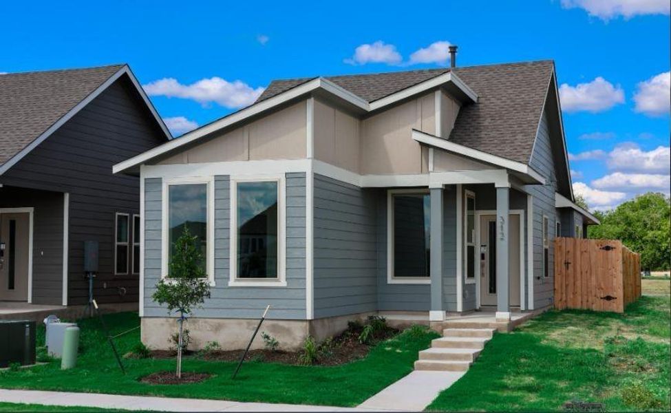 Front exterior of a new home in Blanco Vista, San Marcos, TX, highlighting curb appeal (Image 20).