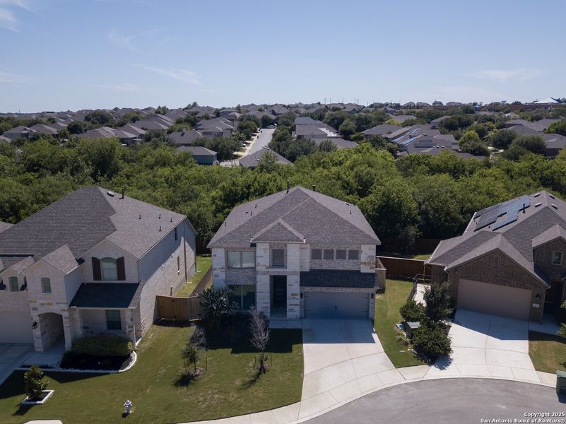 Front exterior of a new home in Weston Oaks 55', San Antonio, TX, highlighting curb appeal (Image 26). Front exterior of a new home in Weston Oaks 55', San Antonio, TX, highlighting curb appeal (Image 26).