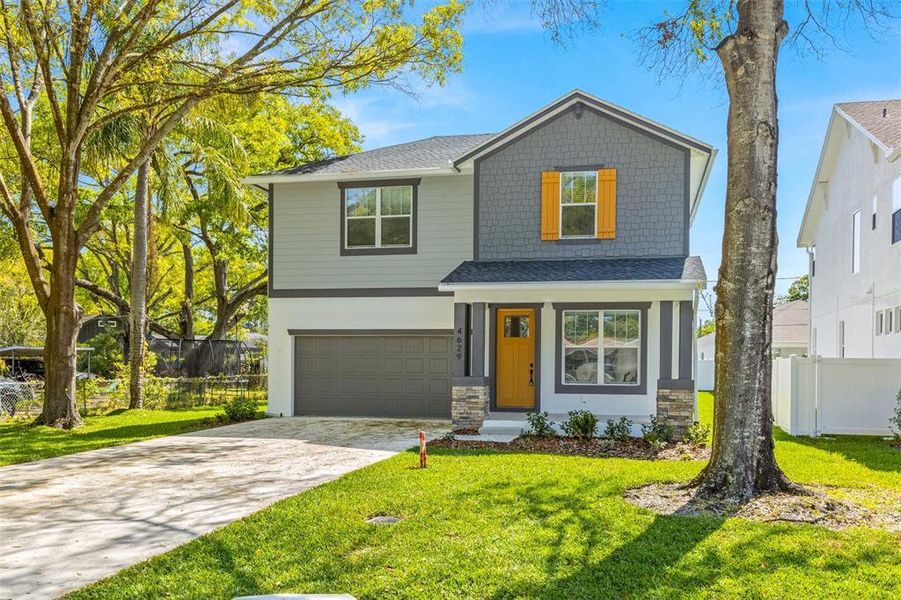 Front exterior of a new home in , Tampa, FL, highlighting curb appeal (Image 19).