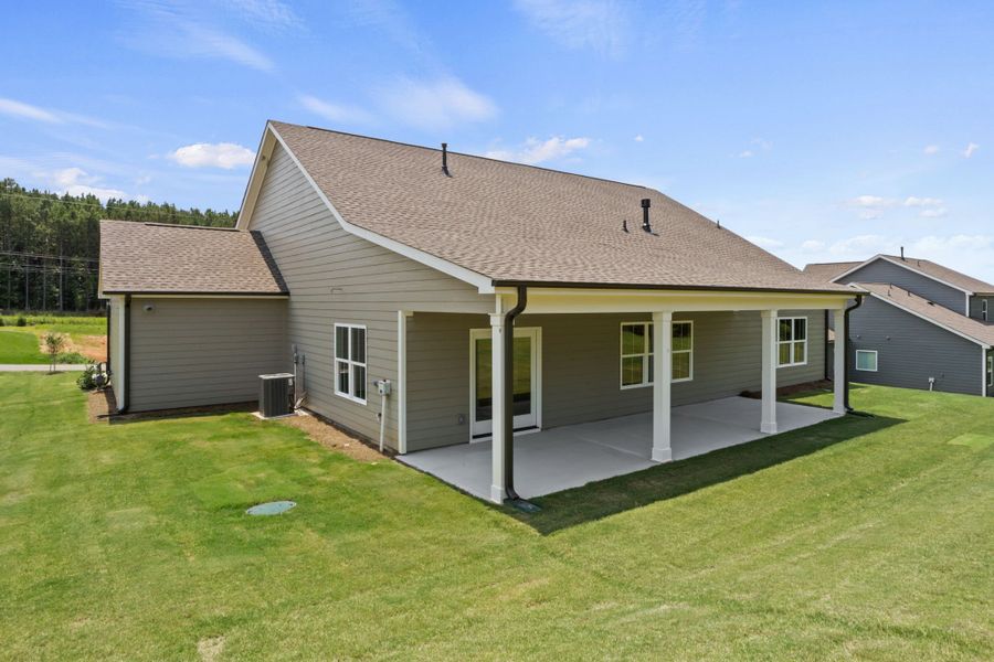 Exterior details and patio area of a home in Cherokee Knoll, Williamston (Image 17).