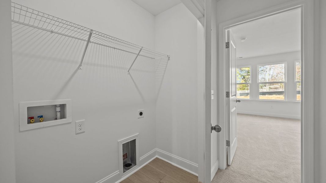 Furnished interior view inside a new home in Bell Glen, Charlotte (Image 13).