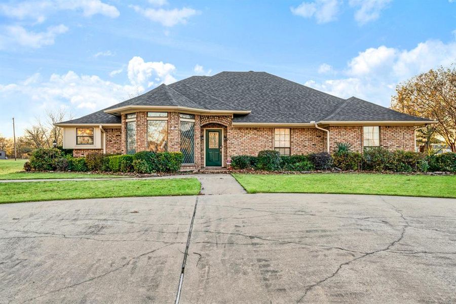 Front exterior of a new home in , Paris, TX, highlighting curb appeal (Image 1). Front exterior of a new home in , Paris, TX, highlighting curb appeal (Image 1).