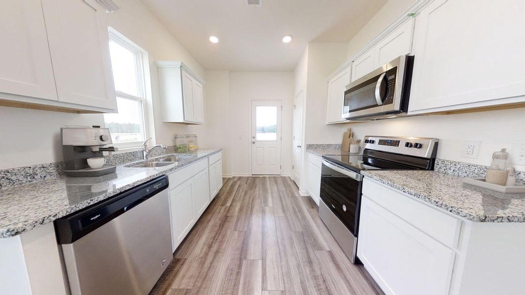 Furnished interior view inside a new home in Crossing at Givhans, Ridgeville (Image 3).