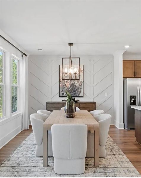An inviting dining room features a striking accent An inviting dining room features a striking accent