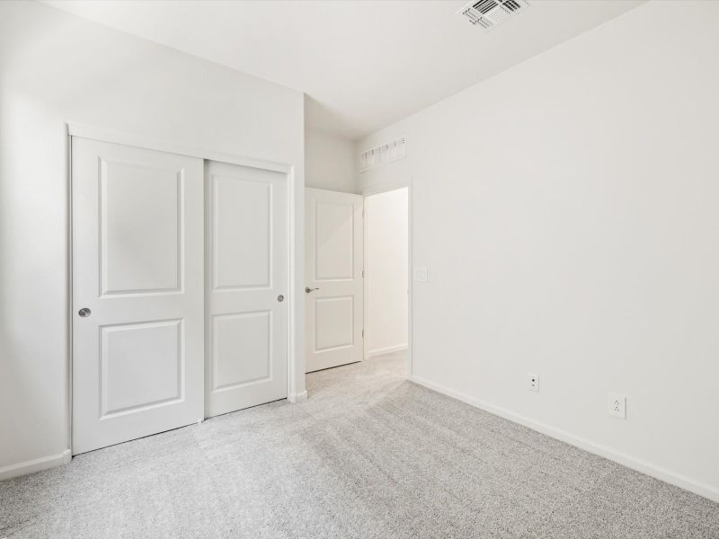 Spacious, unfurnished interior of a new home in Mandarina - Signature Series, Marana (Image 12).