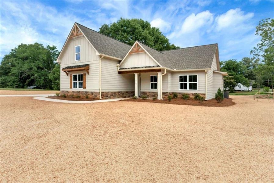 Front exterior of a new home in , Maysville, GA, highlighting curb appeal (Image 26).