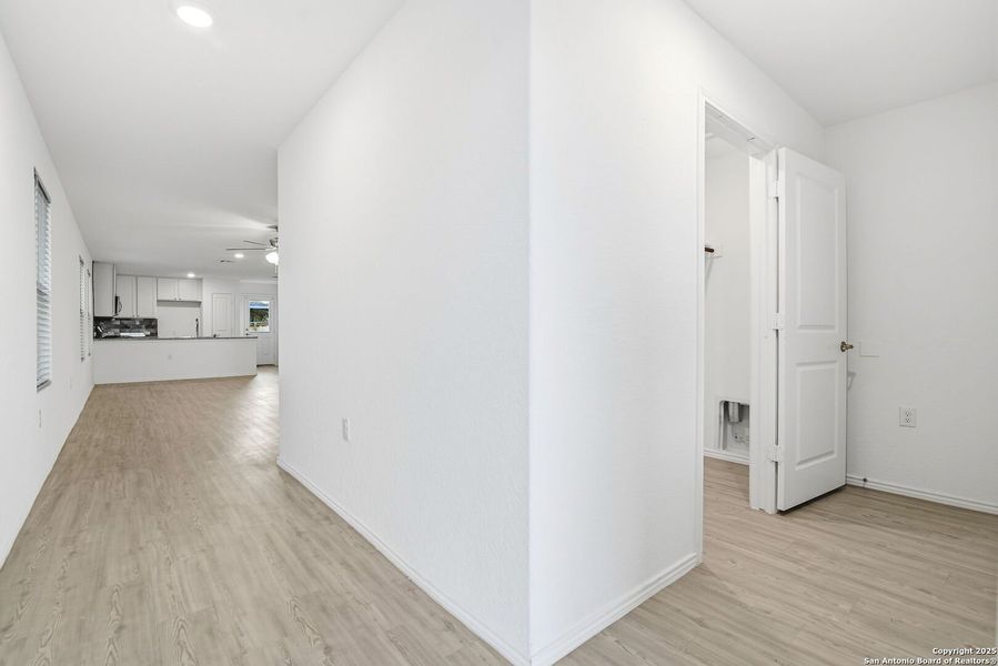 Spacious, unfurnished interior of a new home in Vida: Cottage Collection, San Antonio (Image 19). Spacious, unfurnished interior of a new home in Vida: Cottage Collection, San Antonio (Image 19).