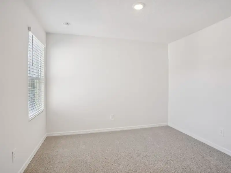 Spacious, unfurnished interior of a new home in The Meadow at Crossprairie Townes, St. Cloud (Image 12).