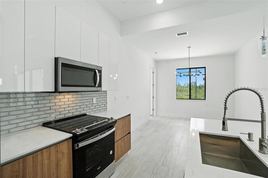 Furnished interior view inside a new home in , Port Charlotte (Image 7).