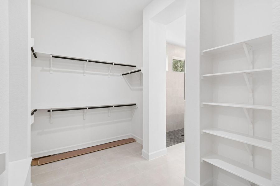 His and her walk in closets too!