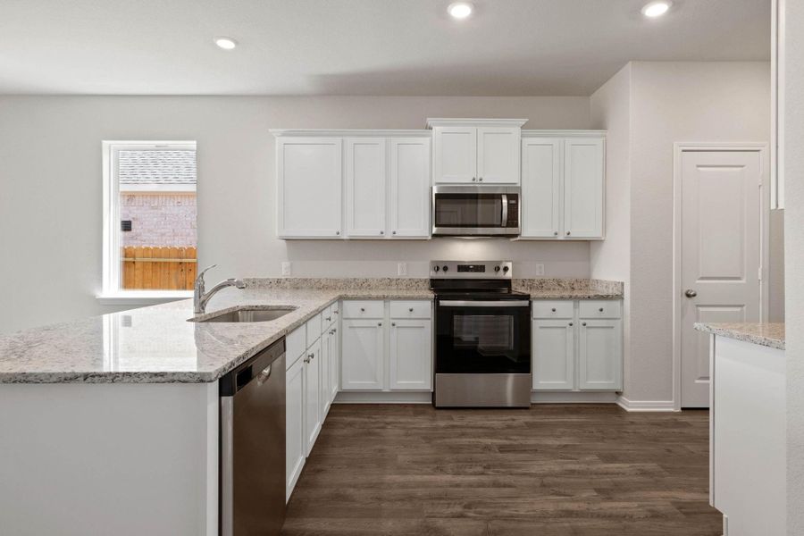 Furnished interior view inside a new home in Vacek Country Meadows, Richmond (Image 4).