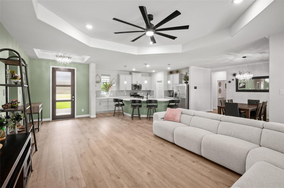 Living space that seamlessly connects the kitchen, breakfast, and family room.