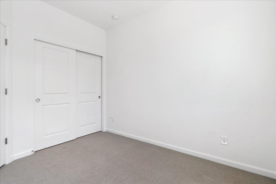 A room with white doors.