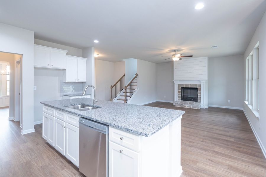 The kitchen and breakfast area open for a casual lifestyle