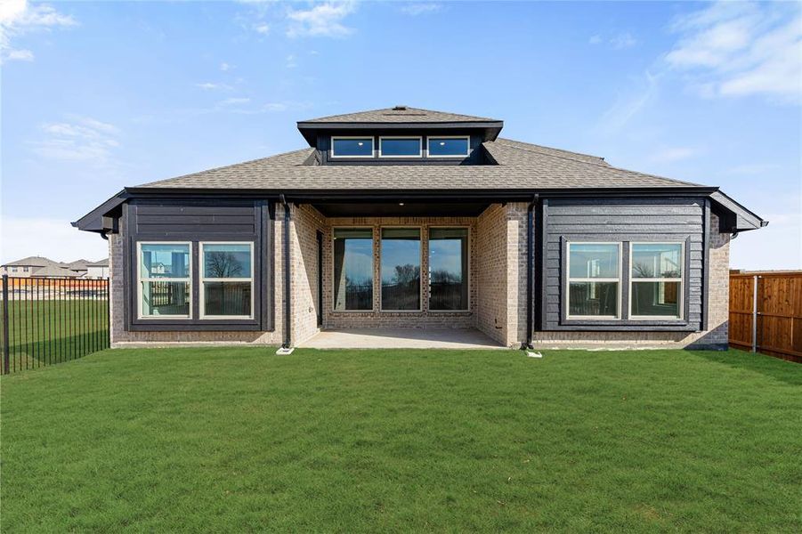 Exterior details and patio area of a home in Creekview Meadows, Pilot Point (Image 27).