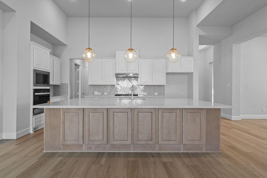 Furnished interior view inside a new home in Valencia 70', Manvel (Image 13).