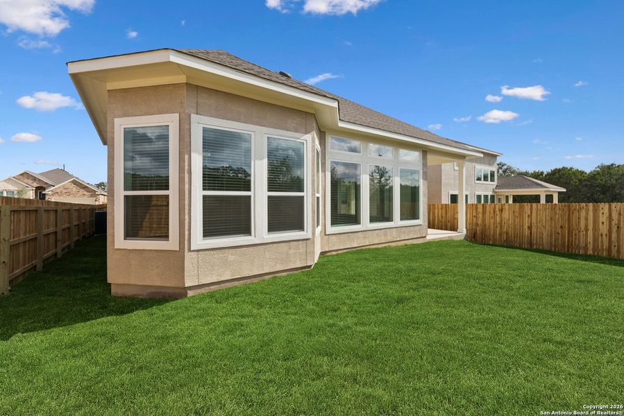 Exterior details and patio area of a home in Davis Ranch 50', San Antonio (Image 4).