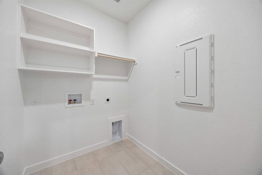 Utility Room in the Oscar home plan by Trophy Signature Homes – REPRESENTATIVE PHOTO Utility Room in the Oscar home plan by Trophy Signature Homes – REPRESENTATIVE PHOTO