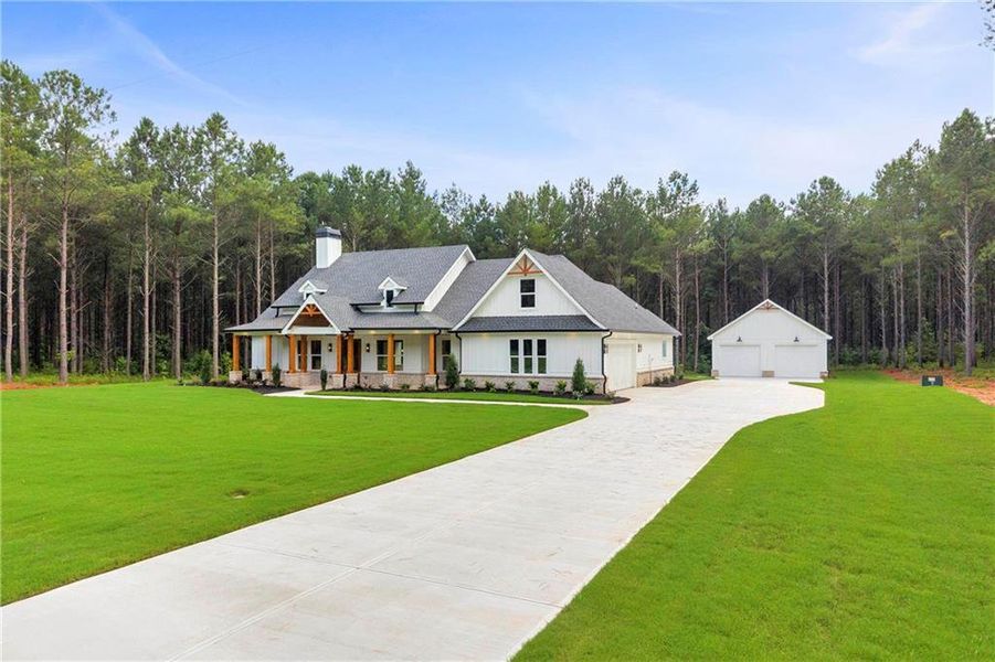 Front exterior of a new home in , Monroe, GA, highlighting curb appeal (Image 33).