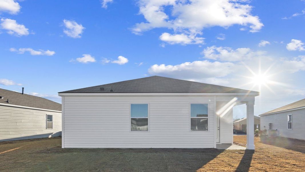 Exterior details and patio area of a home in Palm Ridge, Guyton (Image 4).