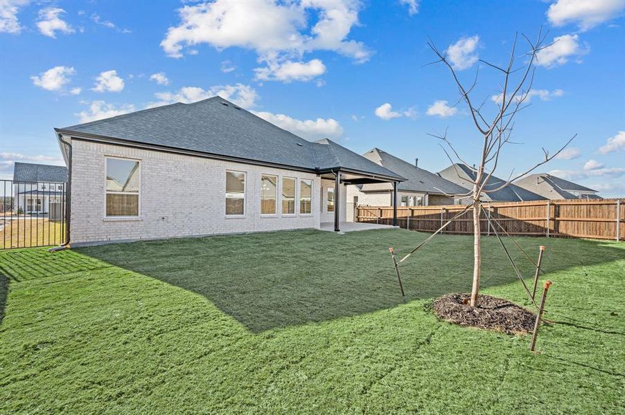 Exterior details and patio area of a home in Parks of Aledo, Aledo (Image 4).
