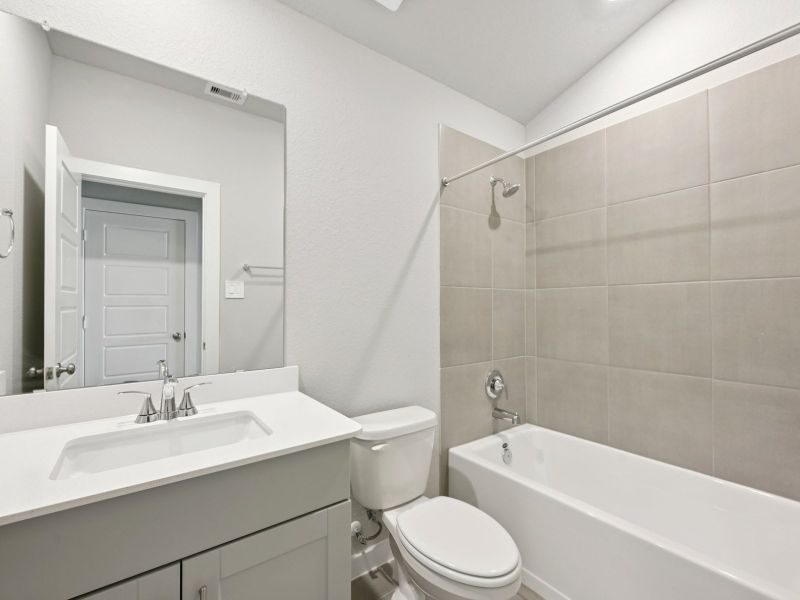 Furnished interior view inside a new home in Sundance Cove - Premier Series, Crosby (Image 7). Furnished interior view inside a new home in Sundance Cove - Premier Series, Crosby (Image 7).