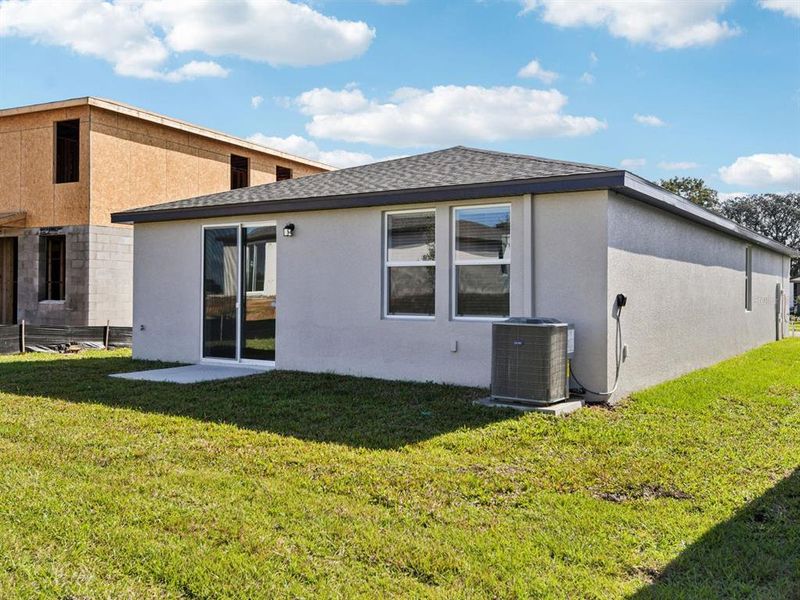 Exterior details and patio area of a home in Benton Hills - Premier Series, Brooksville (Image 2).