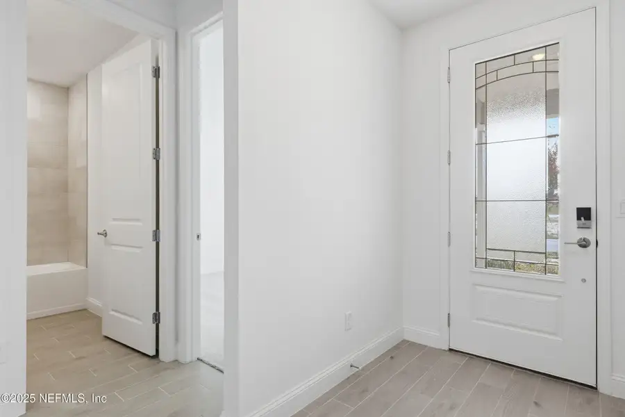 Spacious, unfurnished interior of a new home in Edenbrooke at Hyland Trail | 55+: Edenbrooke at Hyland Trail 60s, Green Cove Springs (Image 11). Spacious, unfurnished interior of a new home in Edenbrooke at Hyland Trail | 55+: Edenbrooke at Hyland Trail 60s, Green Cove Springs (Image 11).