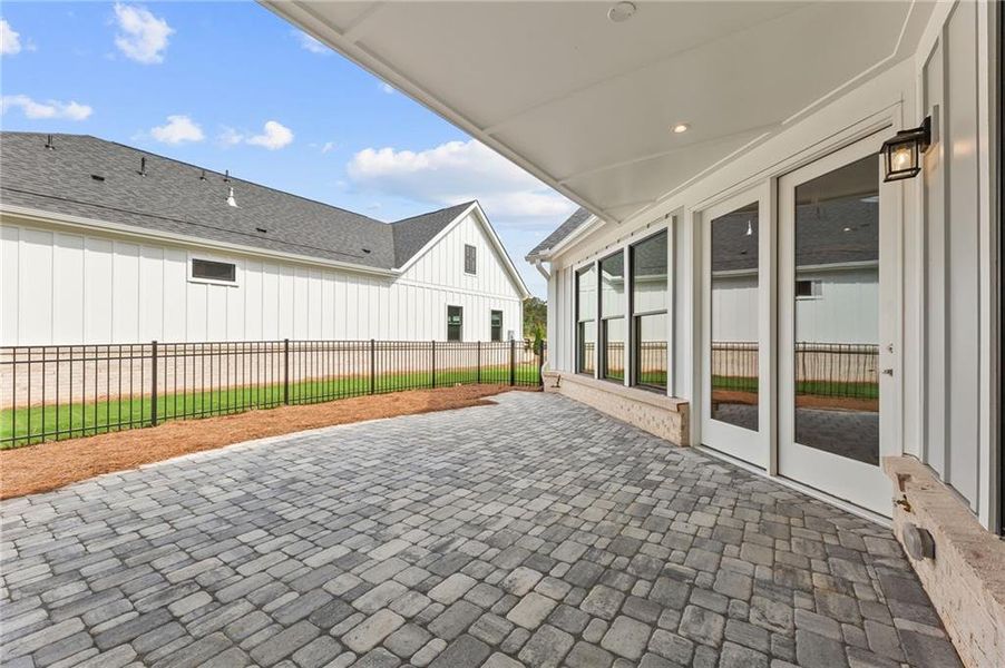 Exterior details and patio area of a home in The Courtyards by The Manor, Alpharetta (Image 3).