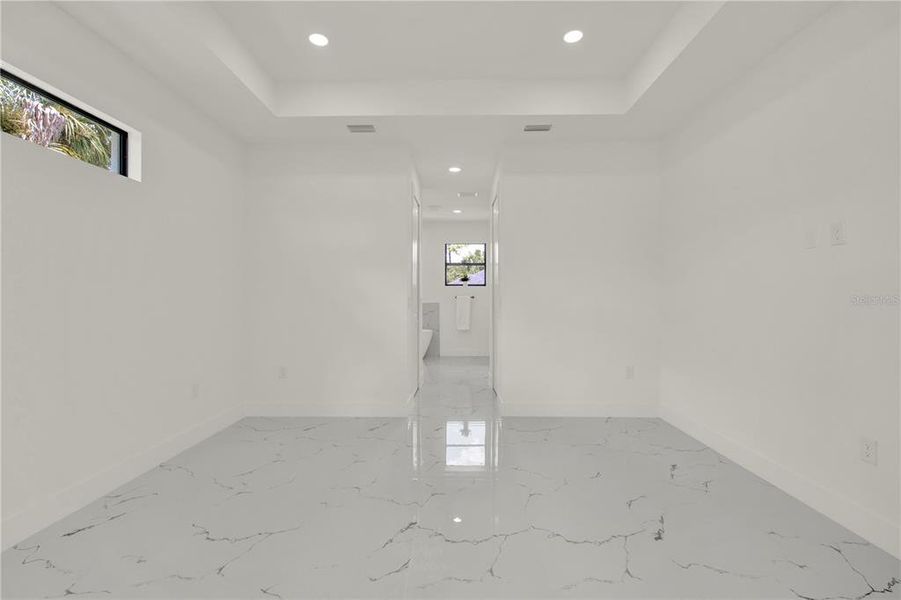 Spacious, unfurnished interior of a new home in , Port Charlotte (Image 24).