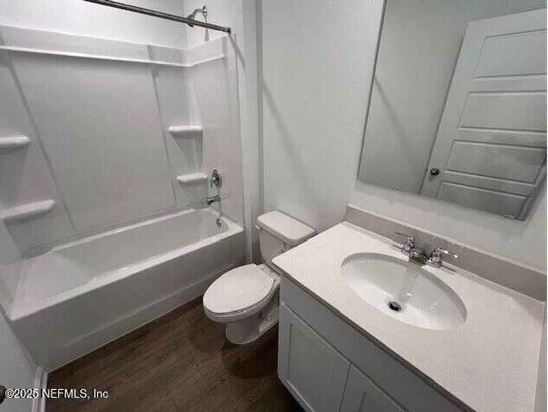 Furnished interior view inside a new home in Sawmill Branch, Palm Coast (Image 15). Furnished interior view inside a new home in Sawmill Branch, Palm Coast (Image 15).