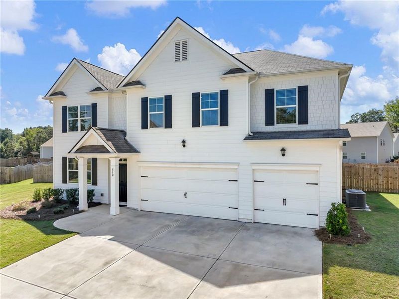 Front exterior of a new home in , Braselton, GA, highlighting curb appeal (Image 27). Front exterior of a new home in , Braselton, GA, highlighting curb appeal (Image 27).