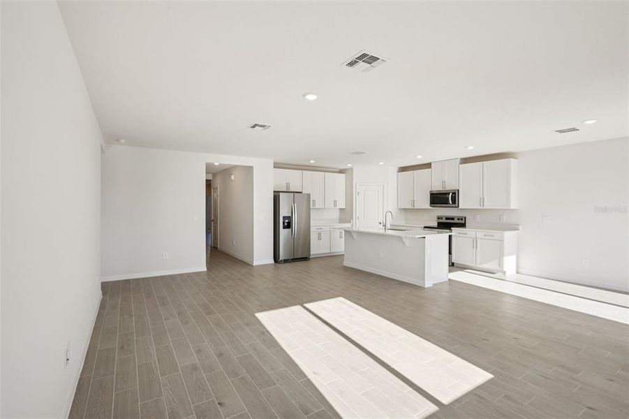 Spacious, unfurnished interior of a new home in The Grove at Stuart Crossing - Classic Series, Bartow (Image 28).