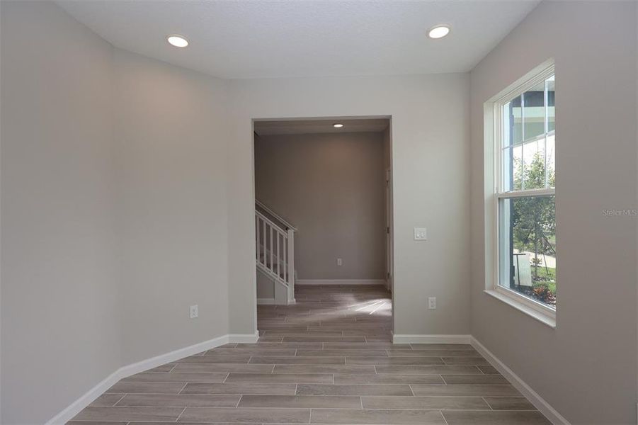 Spacious, unfurnished interior of a new home in Tribute at Ovation, Winter Garden (Image 33).