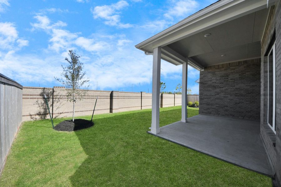 Front exterior of a new home in Bridgeland: Heritage Collection, Cypress, TX, highlighting curb appeal (Image 19). Front exterior of a new home in Bridgeland: Heritage Collection, Cypress, TX, highlighting curb appeal (Image 19).