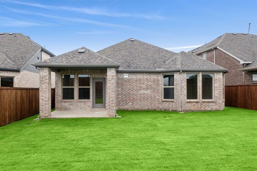 Front exterior of a new home in Lilybrooke at Legacy Hills, Celina, TX, highlighting curb appeal (Image 16). Front exterior of a new home in Lilybrooke at Legacy Hills, Celina, TX, highlighting curb appeal (Image 16).