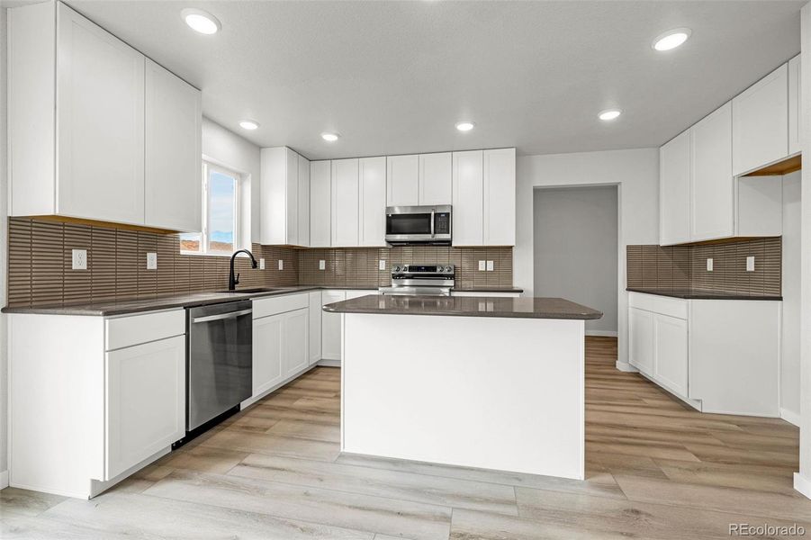 Furnished interior view inside a new home in , Colorado Springs (Image 10).