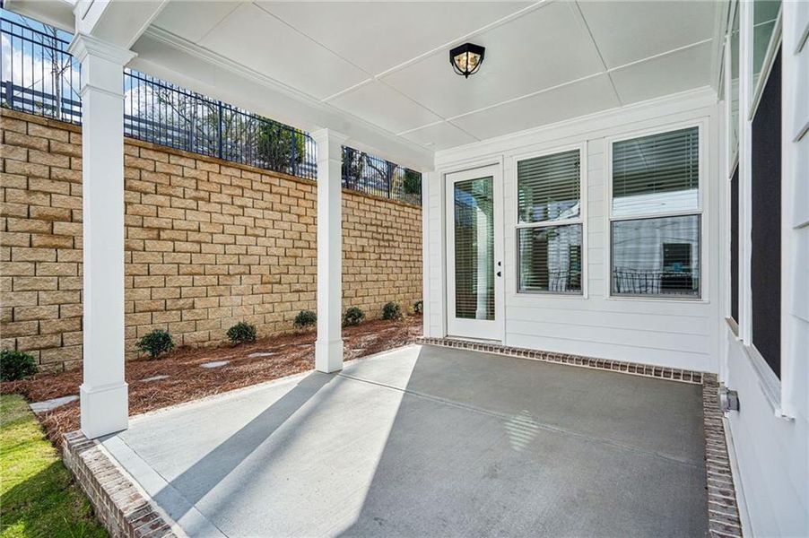 Exterior details and patio area of a home in Promenade at Sawnee Village, Cumming (Image 4).